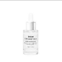 A hand applying Ultra Hydrate B5 serum onto a clean, damp face, showcasing its hydrating texture.