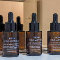 LUXE VITAMIN C SERUM bottle, featuring a luxurious design, packed with vitamin C and rosehip oil for radiant skin.