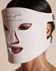 Close-up of the Solaine Pro LED face mask on a model, emphasizing the mask's powerful light therapy for improved skin health