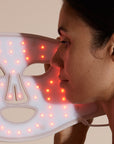 Solaine Pro LED face mask showcasing red light therapy in use, promoting skin rejuvenation and reducing the appearance of fine lines