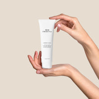 AHA Super Combo Cleanser bottle with Glycolic, Tartaric, and Malic Acids for radiant skin.