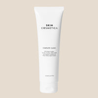 Close-up of AHA Super Combo Cleanser highlighting Organic Cranberry and White Willow Bark Extract.