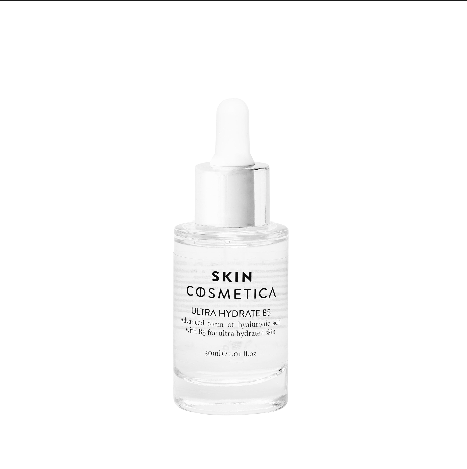 A hand applying Ultra Hydrate B5 serum onto a clean, damp face, showcasing its hydrating texture.