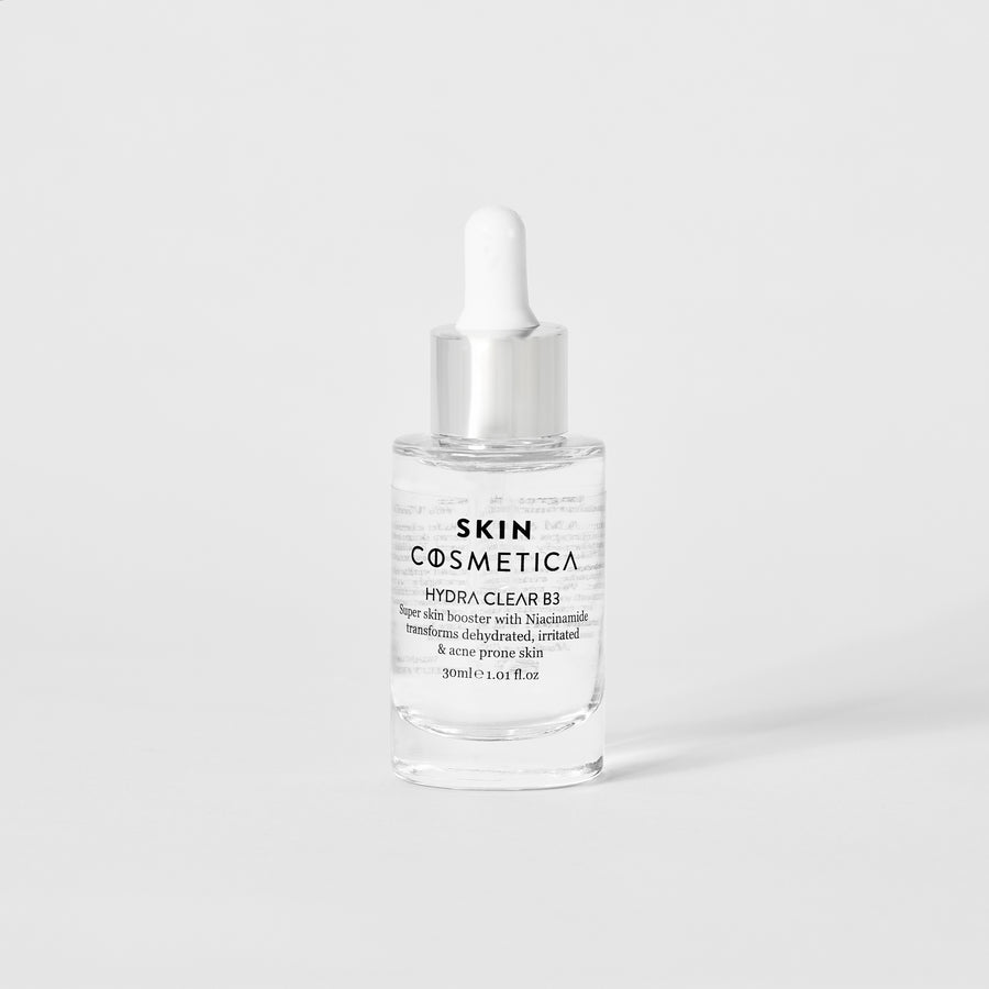HYDRA CLEAR B3 serum bottle with a dropper, featuring Niacinamide and Hyaluronic Acid for deep hydration and skin regeneration.