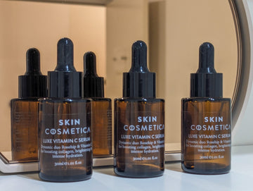  LUXE VITAMIN C SERUM bottle, featuring a luxurious design, packed with vitamin C and rosehip oil for radiant skin.