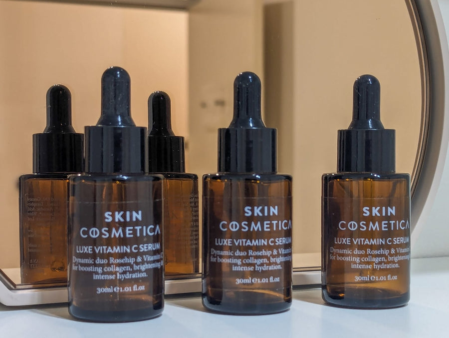  LUXE VITAMIN C SERUM bottle, featuring a luxurious design, packed with vitamin C and rosehip oil for radiant skin.